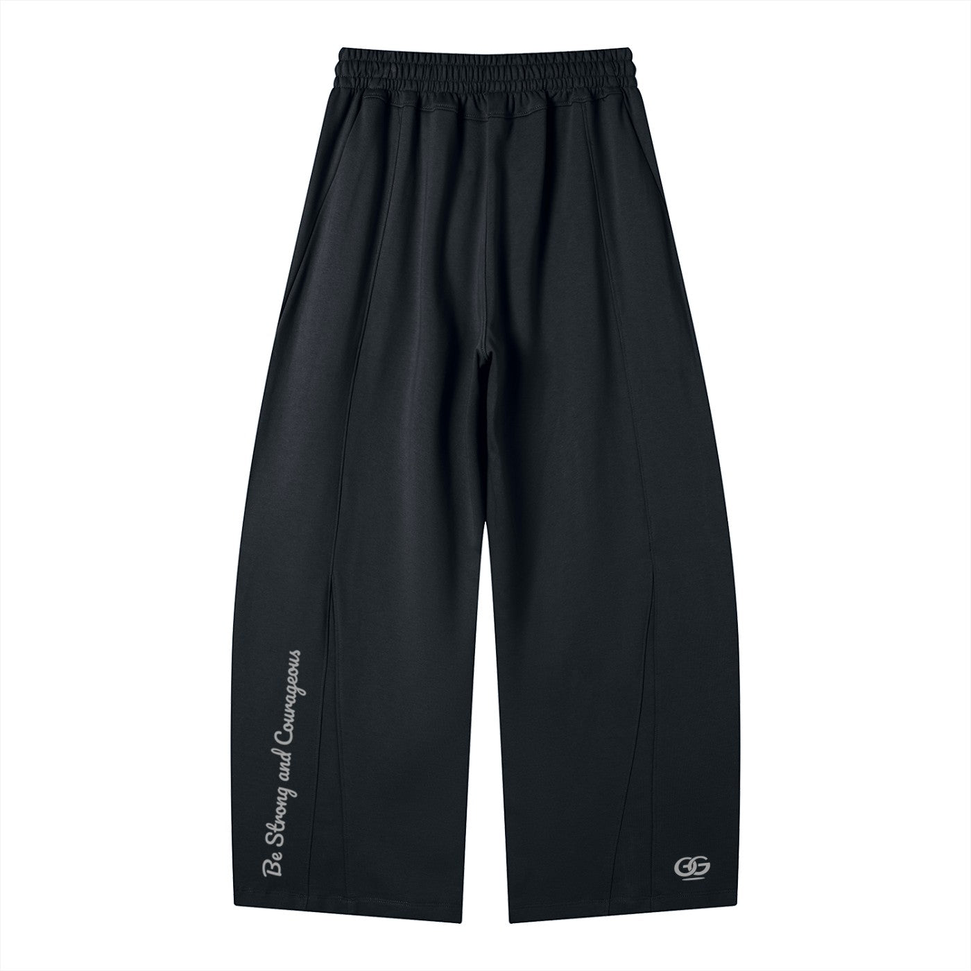 Greater Good black wide-leg sweatpants with elastic waist, drawstring, and side pockets. Features text print "Be Strong and Courageous" and GG logo.